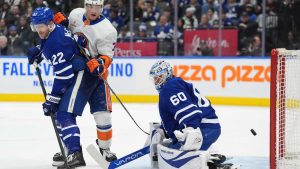 Toronto Maple Leafs goaltender Joseph Woll (60) reacts after New York Islanders centre Bo Horvat, not shown, scores during third period NHL action. (Frank Gunn/CP)