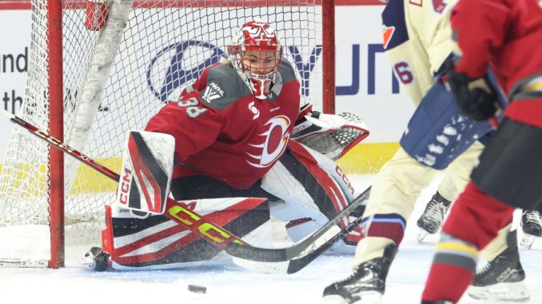 Ottawa Charge goaltender Emerance Maschmeyer (38) eyes the puck as Montreal Victoire's Clair Degeorge (26) tries to score during third period PWHL action in Ottawa on Friday, Dec. 6, 2024. (Patrick Doyle/CP)
