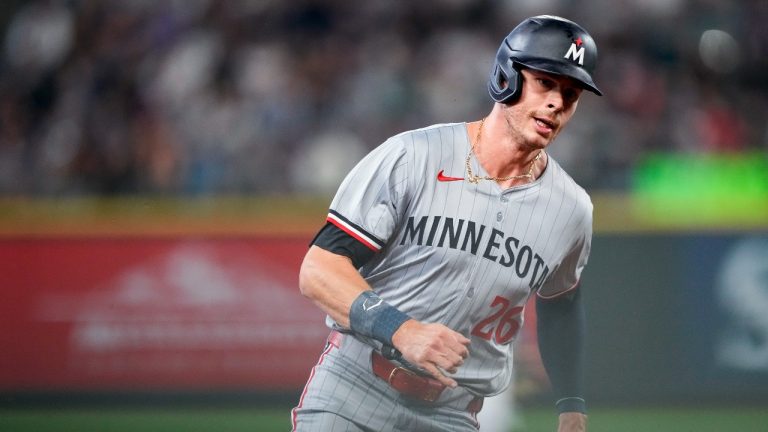 Minnesota Twins' Max Kepler runs home to score on an RBI single from Jose Miranda against the Seattle Mariners during the second inning of a baseball game Saturday, June 29, 2024, in Seattle. (Lindsey Wasson/AP)