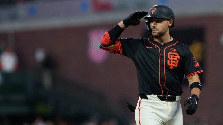 San Francisco Giants' Michael Conforto reacts after hitting a single during the sixth inning of a baseball game against the Miami Marlins, Saturday, Aug. 31, 2024, in San Francisco. (Godofredo A. Vásquez/AP)