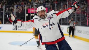 Washington Capitals left wing Alex Ovechkin (8) celebrates after scoring against the Vegas Golden Knights for a hat trick during the third period of an NHL hockey game Sunday, Nov. 17, 2024, in Las Vegas. (John Locher/AP)