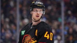 Vancouver Canucks' Elias Pettersson waits for a faceoff against the St. Louis Blues during the second period of an NHL hockey game in Vancouver, on Tuesday, December 10, 2024. (Darryl Dyck/CP)