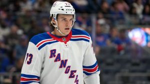 New York Rangers' Matt Rempe stands on the ice during the second period of an NHL pre-season hockey game against the New York Islanders, Friday, Oct. 4, 2024, in New York. (Pamela Smith/AP)