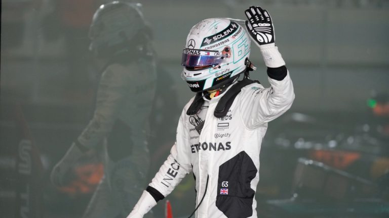 Mercedes driver George Russell of Britain waves after taking second place during sprint qualifying at the Lusail International Circuit in Lusail, Qatar, ahead of the Qatar Formula One Grand Prix, Friday, Nov. 29, 2024. (Darko Bandic/AP)