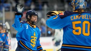 Toronto Sceptres' Sarah Nurse (20) celebrates her goal against the Boston Fleet with teammate goalie Kristen Campbell (50) during first period PWHL hockey action in Toronto on Saturday, Nov. 30, 2024. (Frank Gunn/CP)