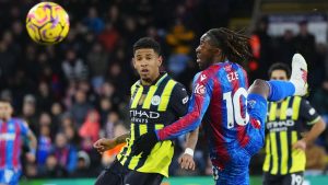 Manchester City's Savinho, left, and Crystal Palace's Eberechi Eze in action during the English Premier League soccer match between Crystal Palace and Manchester City at Selhurst Park in London, Saturday Dec. 7, 2024. (Dave Shopland/AP)