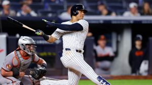 New York Yankees' Juan Soto, right, follows through on single during the sixth inning of a baseball game against the Baltimore Orioles, Thursday, Sept. 26, 2024, in New York. (Noah K. Murray/AP)