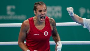 Canada's Tammara Thibeault celebrates beating Panama's Atheyna Bylon in the women's boxing 75kg final bout at the Pan American Games in Santiago, Chile, Friday, Oct. 27, 2023. (Dolores Ochoa/AP)