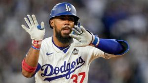 Los Angeles Dodgers' Teoscar Hernández celebrates his two-run home run against the New York Yankees during the third inning in Game 2 of the baseball World Series, Saturday, Oct. 26, 2024, in Los Angeles. (Ashley Landis/AP)