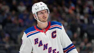 New York Rangers' Jacob Trouba stands on the ice during the second period of an NHL pre-season hockey game against the New York Islanders, Friday, Oct. 4, 2024, in New York. (Pamela Smith/AP)