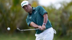 Hideki Matsuyama, of Japan, chips onto the 14th green during the third round of The Sentry golf event, Saturday, Jan. 4, 2025, at Kapalua Plantation Course in Kapalua, Hawaii. (Matt York/AP)