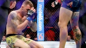 Renato Moicano, left, celebrates after a UFC win over Cub Swanson in 2018. (Chris Carlson/AP)