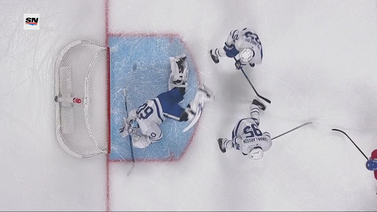 Maple Leafs’ Woll dives across crease to deny Canadiens’ Suzuki