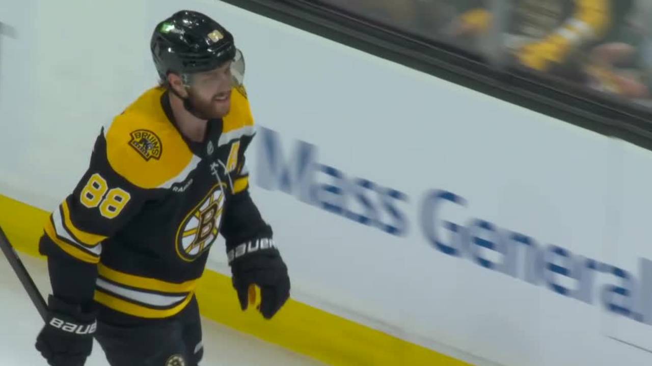 Bruins’ Pastrnak banks shot off Sharks defence for power-play marker