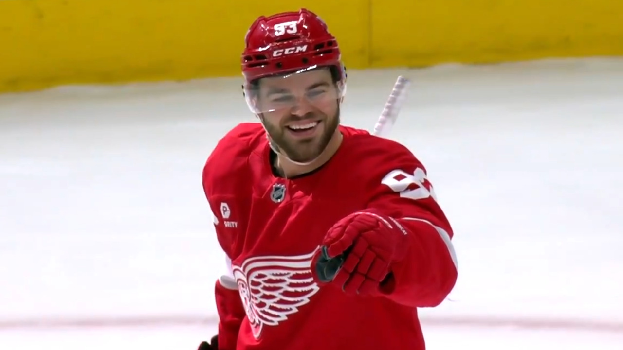 Red Wings’ Raymond fools everyone to gift DeBrincat an easy goal