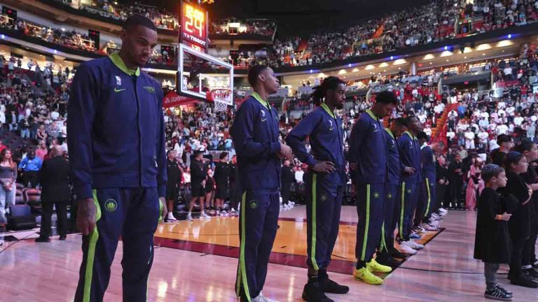 New Orleans Pelicans players stand during a tribute at the Kaseya Center for people killed after a vehicle drove into a crowd in New Orleans before an NBA basketball game between the Miami Heat and the New Orleans Pelicans, Wednesday, Jan. 1, 2025, in Miami. (Lynne Sladky/AP)