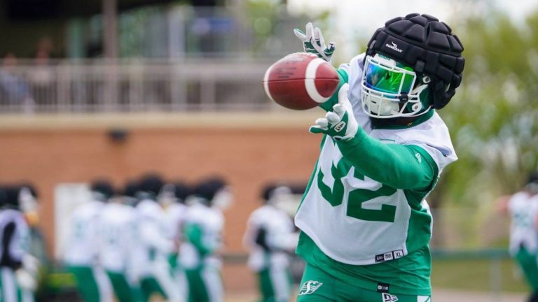 Saskatchewan Roughriders linebacker A.J. Allen catches the football before a spring training scrimmage in Saskatoon on Saturday, May 18, 2024. (CP/Heywood Yu)