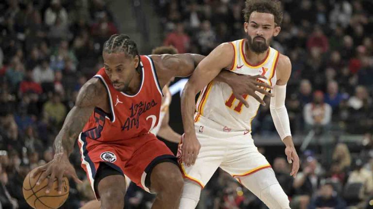 Los Angeles Clippers forward Kawhi Leonard, left, steals the ball from Atlanta Hawks guard Trae Young during the first half of an NBA basketball game Saturday, Jan. 4, 2025, in Los Angeles. (Jayne-Kamin-Oncea/AP)