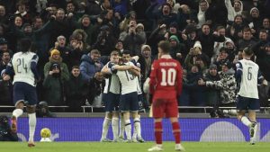 Tottenham's Dominic Solanke celebrates with teammates after scores a disallowed goal during the English League Cup semi final first leg soccer match between Tottenham and Liverpool, at the Tottenham Hotspur Stadium in London, Wednesday, Jan. 8, 2025. (Ian Walton/AP)