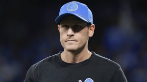 Detroit Lions offensive coordinator Ben Johnson watches during warmups before an NFL divisional playoff game against the Washington Commanders. (AP Photo/Rey Del Rio)