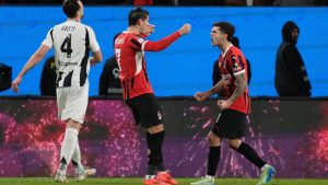 AC Milan's Alvaro Morata, left, and Christian Pulisic celebrate after scoring during the Italian Super Cup semifinal soccer match between Juventus and Milan in Riyadh, Saudi Arabia, Friday, Jan. 3, 2025. (AP/Altaf Qadri)