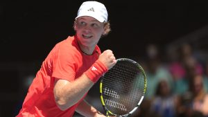 Alex Michelsen of the U.S. reacts after winning a point against Stefanos Tsitsipas of Greece during their first round match at the Australian Open tennis championship in Melbourne, Australia, Monday, Jan. 13, 2025. (Ng Han Guan/AP)