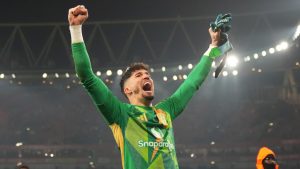 Manchester United's goalkeeper Altay Bayindir celebrates after winning the English FA Cup soccer match between Arsenal and Manchester United at the Emirates stadium in London, Sunday, Jan. 12, 2025. (Kin Cheung/AP)