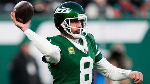 New York Jets quarterback Aaron Rodgers throws during the first half of an NFL football game against the Miami Dolphins, Sunday, Jan. 5, 2025, in East Rutherford, N.J. (Seth Wenig/AP)