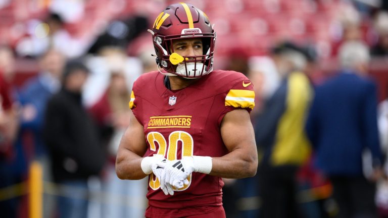 Washington Commanders running back Austin Ekeler (30) works out before an NFL football game against the Pittsburgh Steelers, Sunday, Nov. 10, 2024, in Landover, Md. (AP Photo/Nick Wass)