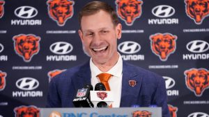 Chicago Bears new coach Ben Johnson smiles following his introduction at an NFL football news conference at Halas Hall in Lake Forest, Ill., Wednesday, Jan. 22, 2025. (AP Photo/Nam Y. Huh)