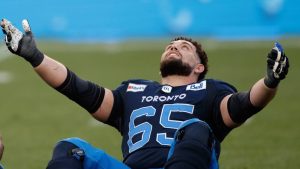 Toronto Argonauts offensive lineman Dariusz Bladek celebrates a win over the Winnipeg Blue Bombers following their CFL game at BMO Field in Toronto, Saturday, Aug. 21, 2021. CP/Cole Burston