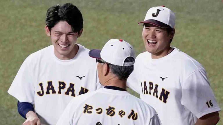 Japan's Roki Sasaki, left, and Shohei Ohtani, right, share a light moment during their team's practice at a stadium in Nagoya, central Japan, on March 3, 2023. (Kyodo News via AP)