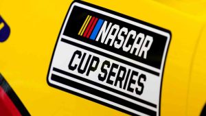 A NASCAR logo is seen on a car during auto race practice at Daytona International Speedway, Saturday, Feb. 19, 2022, in Daytona Beach, Fla. (John Raoux/AP)