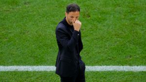 Belgium's head coach Domenico Tedesco gestures during a round of sixteen match between France and Belgium at the Euro 2024 soccer tournament in Duesseldorf, Germany, Monday, July 1, 2024. (AP Photo/Andreea Alexandru)