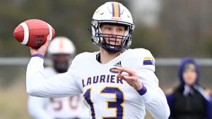 Laurier Golden Hawks quarterback Taylor Elgersma throws a pass during first half Uteck Bowl football action against Bishop's Gaiters in Lennoxville, Que., Saturday November 16, 2024. (Graham Hughes/CP)