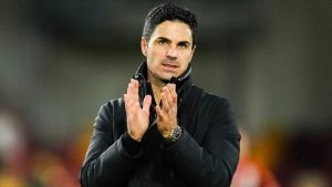 Arsenal's manager Mikel Arteta applauds after the English Premier League soccer match between Brentford and Arsenal at the Gtech Community stadium in London, Wednesday, Jan. 1, 2025. (AP/Kirsty Wigglesworth)