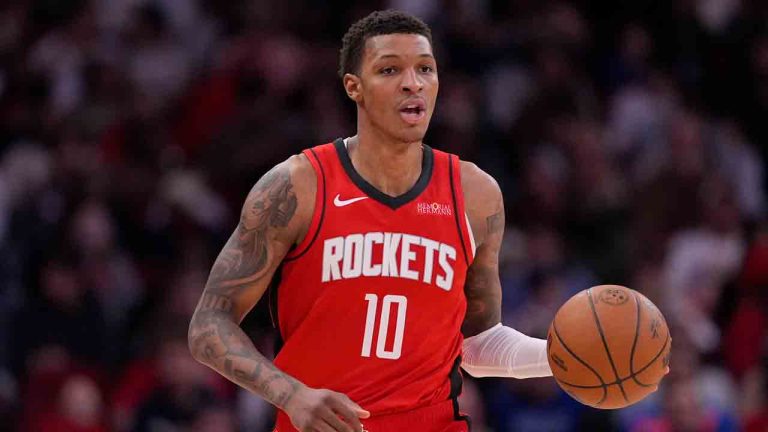 Houston Rockets' Jabari Smith Jr. (10) brings the ball up the court against the Dallas Mavericks during the second half of an NBA basketball game Wednesday, Jan. 1, 2025, in Houston. The Rockets won 110-99. (David J. Phillip/AP)