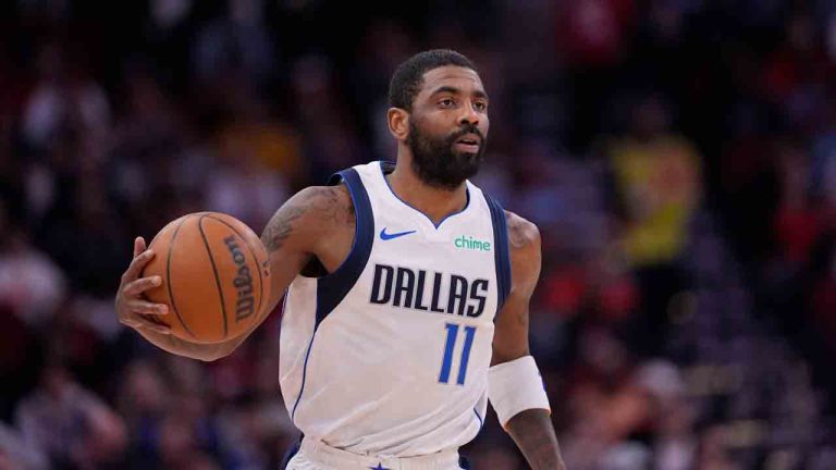 Dallas Mavericks' Kyrie Irving (11) brings the ball up the court against the Houston Rockets during the first half of an NBA basketball game Wednesday, Jan. 1, 2025, in Houston. (David J. Phillip/AP)