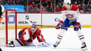 Montreal Canadiens right wing Josh Anderson (17) scores a goal past Washington Capitals goaltender Logan Thompson (48) during the second period of an NHL hockey game, Friday, Jan. 10, 2025, in Washington. (AP Photo/Nick Wass)