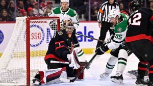 Dallas Stars' Matt Duchene (95) looks towards the puck for a chance on Ottawa Senators goaltender Leevi Merilainen (1) during first period NHL hockey action in Ottawa on Sunday, Jan. 12, 2025. (Justin Tang/CP)