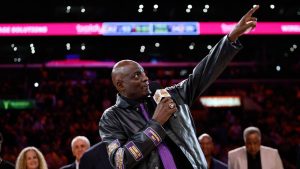 Former Los Angeles Lakers player Michael Cooper, gestures during his jersey retirement ceremony during halftime in a NBA basketball game between the Los Angeles Lakers and the San Antonio Spurs, Monday, Jan. 13, 2025, in Los Angeles. (Kevork Djansezian/AP)