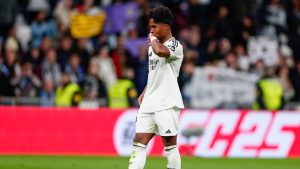 Real Madrid's Endrick celebrates after scoring his side's fifth goal against Celta de Vigo during a Copa del Rey round of 16 soccer match at the Santiago Bernabeu stadium in Madrid, Spain, Friday, Jan. 17, 2025. (AP/Pablo Garcia)