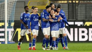 Como's Gabriel Strefezza, center right, celebrates scoring during the Serie A soccer match between Como and Udinese at the Giuseppe Sinigaglia stadium in Como, Italy. (Antonio Saia/LaPresse via AP)