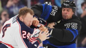 Columbus Blue Jackets' Mathieu Olivier (24) and Toronto Maple Leafs' Ryan Reaves (75) fight during first period NHL hockey action in Toronto on Wednesday, January 22, 2025. (Frank Gunn/CP)