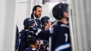 Head coach and GM Andrew Milne manning the Canmore Eagles bench. (Photo courtesy Kaeden Witkowski/Canmore Eagles)