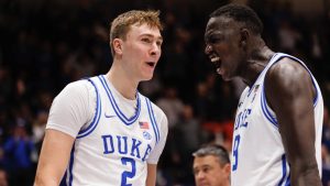 Duke's Cooper Flagg (2) reacts with Khaman Malauch (9) after a dunk during the second half of an NCAA college basketball game agaist Pittsburgh in Durham, N.C., Tuesday, Jan. 7, 2025. (Ben McKeown/AP)