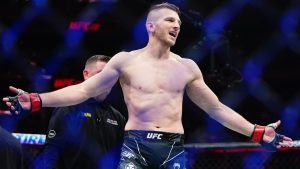 New Zealand's Dan Hooker gestures to his corner after a lightweight bout against Claudio Puelles at UFC 281. (Frank Franklin II/AP)