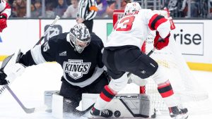 Los Angeles Kings goaltender Darcy Kuemper saves a shot from New Jersey Devils centre Nico Hischier during the first period of an NHL game Wednesday, Jan. 1, 2025 in Los Angeles. (AP/Ryan Sun)