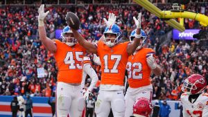 Denver Broncos wide receiver Devaughn Vele (17) celebrates a touchdown against the Kansas City Chiefs during an NFL football game, Sunday, Jan. 5, 2025 in Denver. (Bart Young/AP)