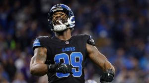 Detroit Lions defensive end Za'Darius Smith (99) celebrates a play against the Minnesota Vikings during the second half of an NFL football game Sunday, Jan. 5, 2025, in Detroit. (Rey Del Rio/AP)